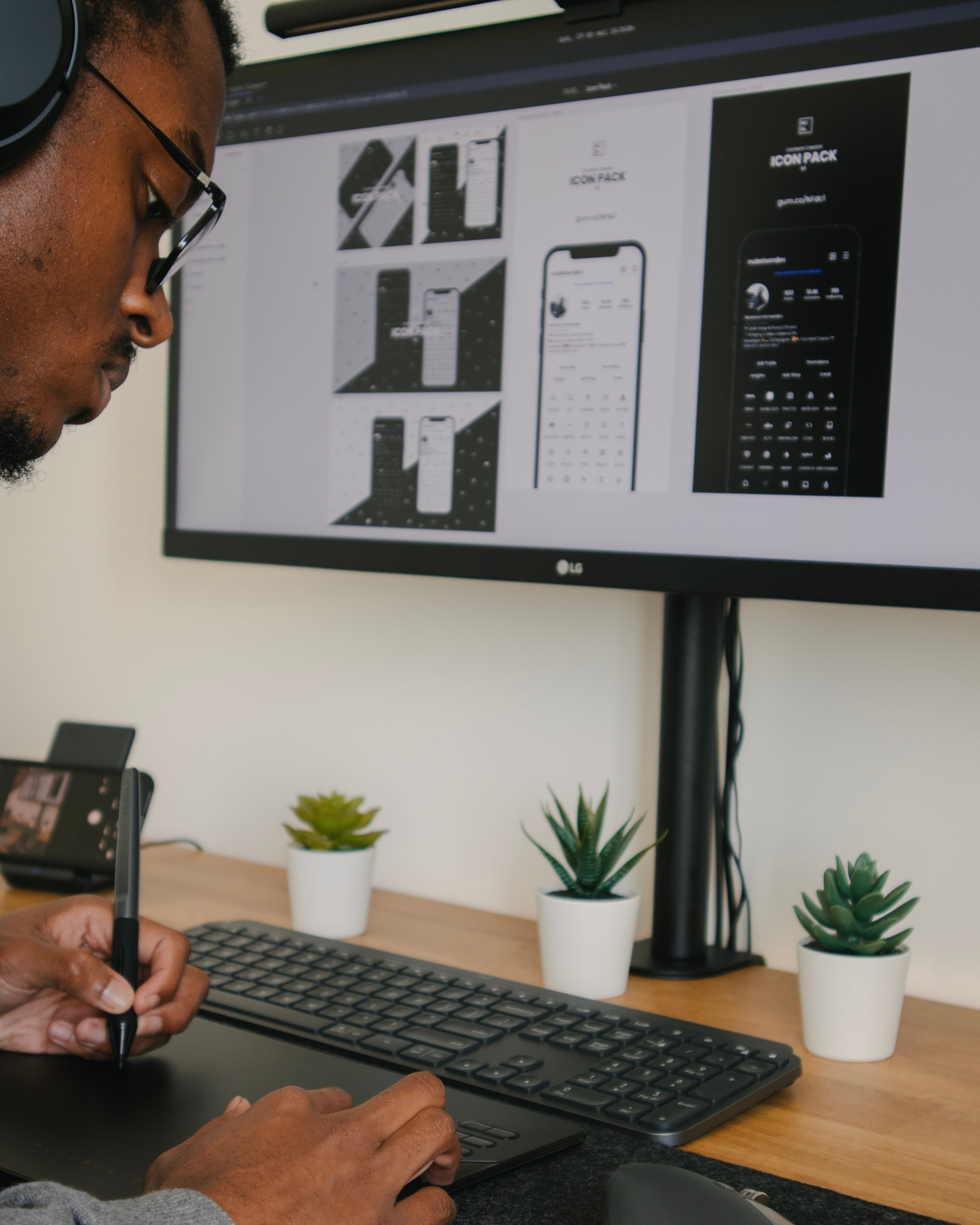 man with PC on desk